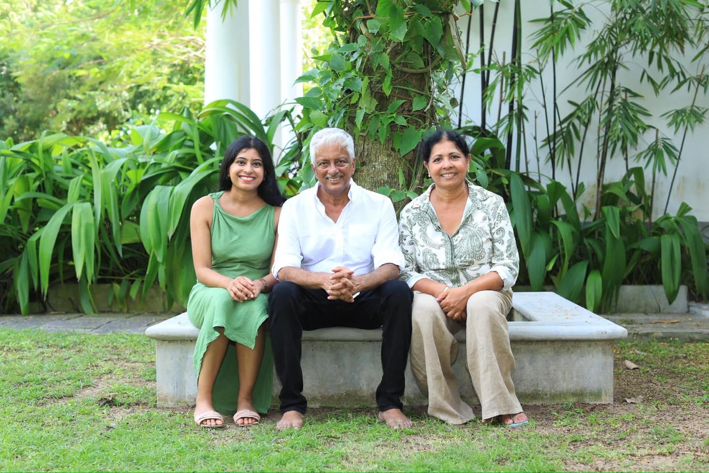 Felician and Anoma Fernandopulle with their daughter Navindi, in the garden of the Dutch Bungalow